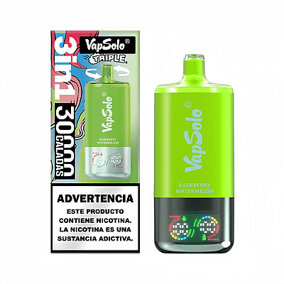Un appareil de vapotage aromatisé à la framboise et à la pastèque de marque VapSolo dans un emballage vert accompagné d'une étiquette d'avertissement indiquant que la nicotine crée une dépendance.