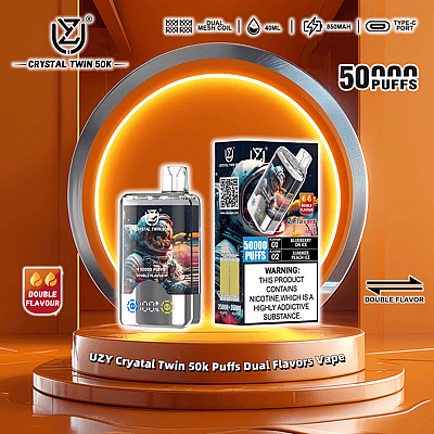 Image promotionnelle présentant le UZY Crystal Twin 50K Puffs Dual Flavors Vape avec son emballage sur un fond à thème orange, mettant en évidence des fonctionnalités telles que la bobine à double maille, la capacité de 40 ml, la batterie de 850 mAh et le port de charge de type C.