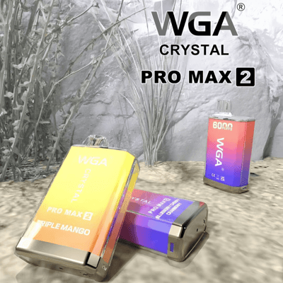 Three WGA Crystal Pro Max 2 vape devices, with colorful gradient designs, displayed on a textured surface with plants in the background.