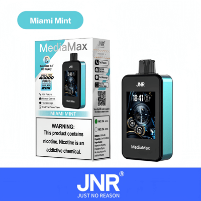 Verpakking en productafbeelding van het JNR MediaMax vape-apparaat in de smaak 'Miami Mint' met een 2,4-inch display, naast de doos, met een nicotinewaarschuwingslabel.