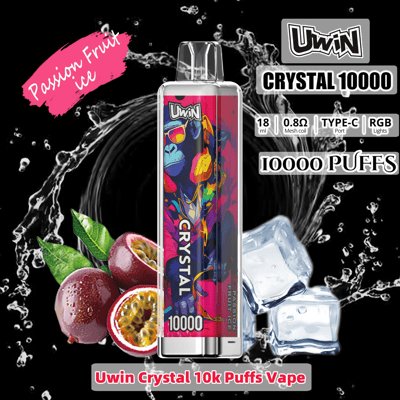 Promotional image featuring the Uwin Crystal 10,000 Puffs Vape with a colorful design, surrounded by passion fruits and ice cubes against a black splash background, highlighting specifications like mesh coil and RGB lighting.