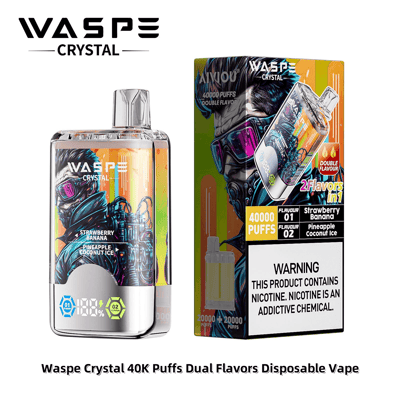 Waspe Crystal 40K Puffs 使い捨て Vape のパッケージに入った製品画像。ストロベリーバナナとパイナップルココナッツアイスの 2 つのフレーバーが、目立つブランドと警告ラベルとともに紹介されています。