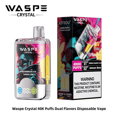 Waspe Crystal 40K Puffs デュアルフレーバー使い捨てベイプとそのパッケージ。鮮やかなアートワークが特徴で、ウォーターメロンアイスとレモンライムのフレーバーのラベルが貼られており、ニコチン含有量に関する警告も記載されています。