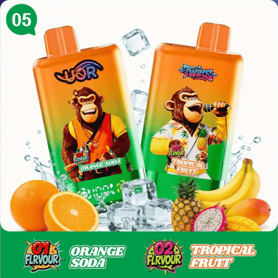 Two juice pouches with cartoon monkeys, labeled Orange Soda and Tropical Fruit, surrounded by ice cubes and tropical fruits.