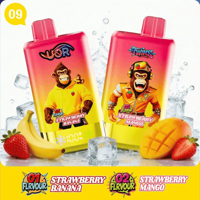 Two colorful juice pouches with cartoon monkey characters, labeled Strawberry Banana and Strawberry Mango, flanked by fruit and ice.