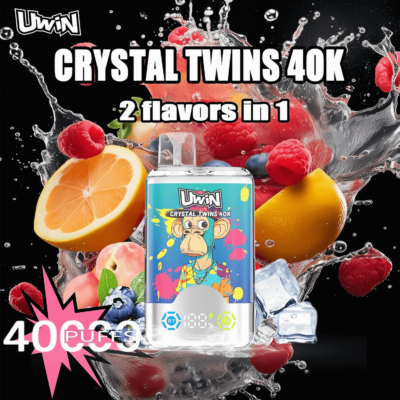 Promotional image for UWIN Crystal Twins 40K, showcasing a colorful vape device with a cartoon monkey design surrounded by fruits like orange slices, raspberries, blueberries, and ice cubes, with text highlighting '2 flavors in 1' and '40,000 puffs'.